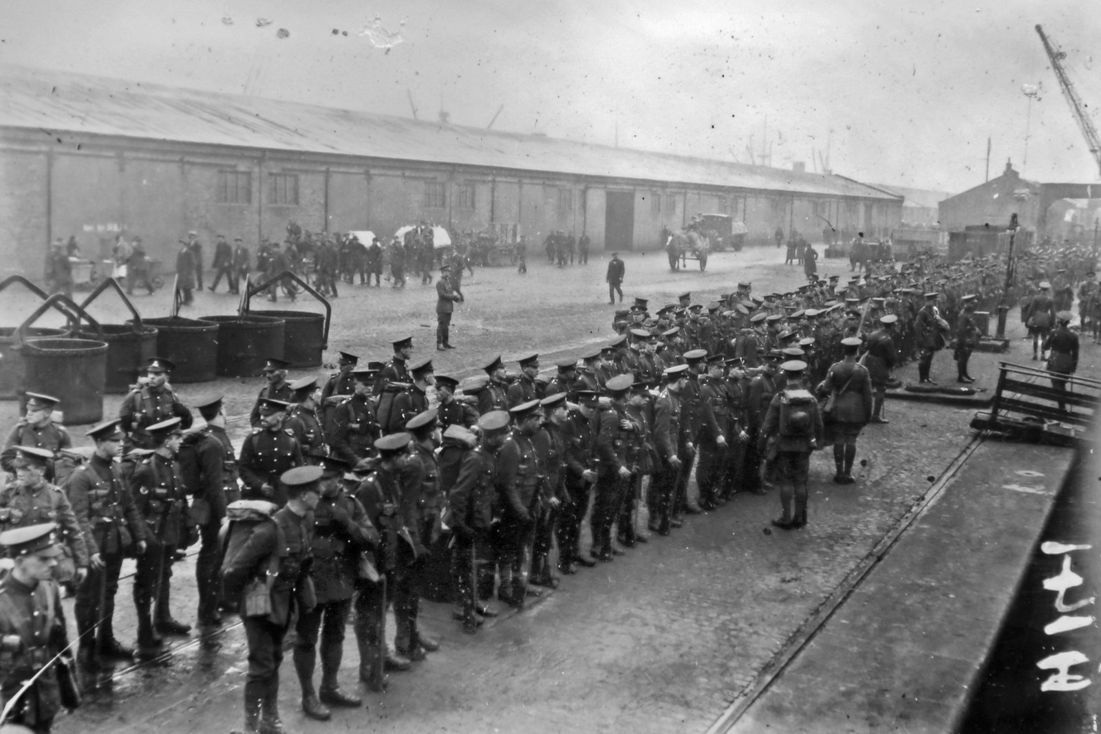 Troops lined up on Quay prior to embarkation
