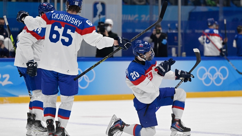 Juraj Slafkovsky celebrates opening the scoring for Slovakia