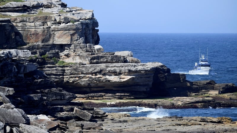 Fisheries boats patrol the area where the attack occurred