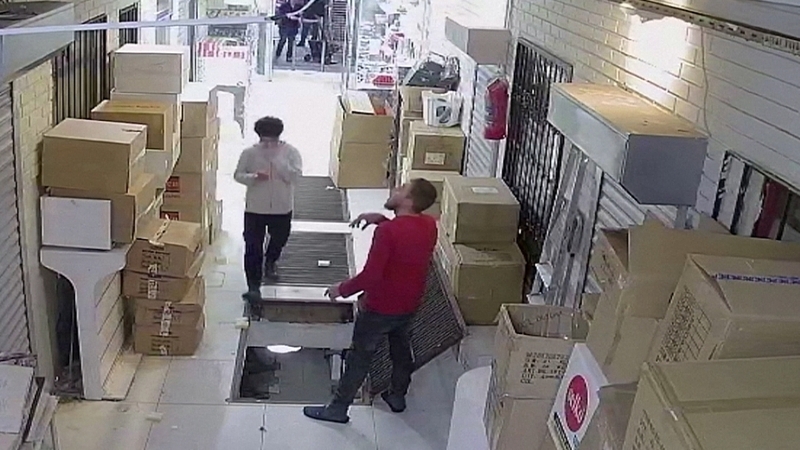 The young man was distracted by his phone