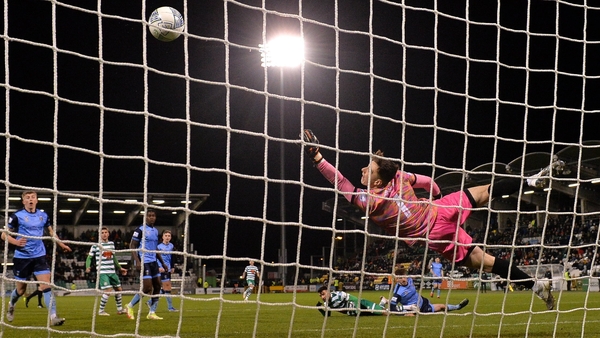 Danny Mandroiu's strike sails past UCD goalkeeper Lorcan Healy.