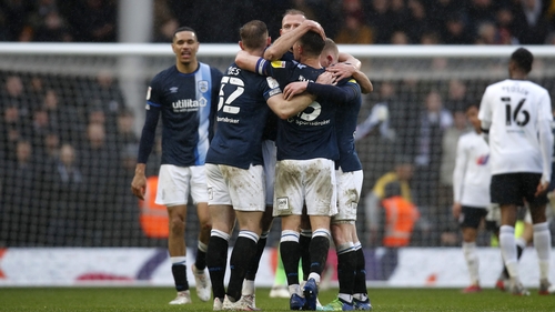 Huddersfield celebrate a surprise win at Fulham