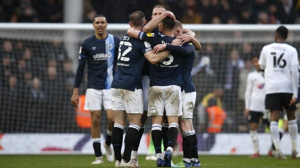Huddersfield celebrate a surprise win at Fulham