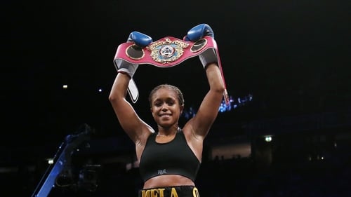 Jonas holds the WBO belt aloft