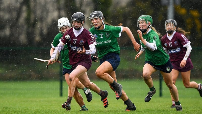 Cliodhna Ni Mhianain of Slaughtneil in action against, from left, Joanne Daly, Kate Gallagher and Laura Ward of Sarsfields