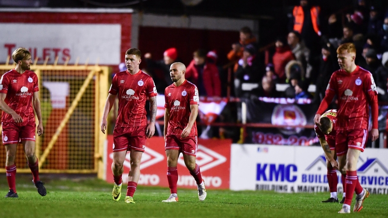 Shelbourne players react after conceding their third goal against St Pat's on Friday's opening night