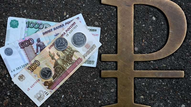 The Russian ruble tumbled to a record low today