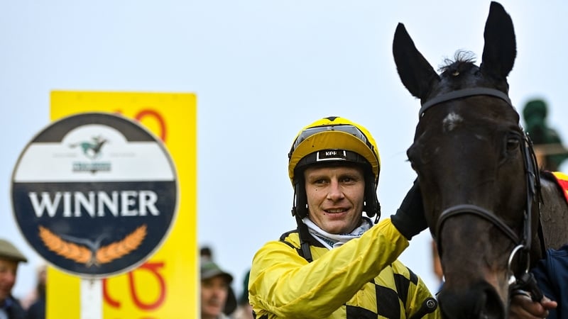 Jockey Paul Townend and Al Boum Photo after winning the Savills New Year's Day Chase