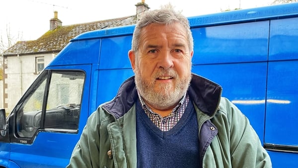 Ken Smollen standing beside his van 'Lazarus'