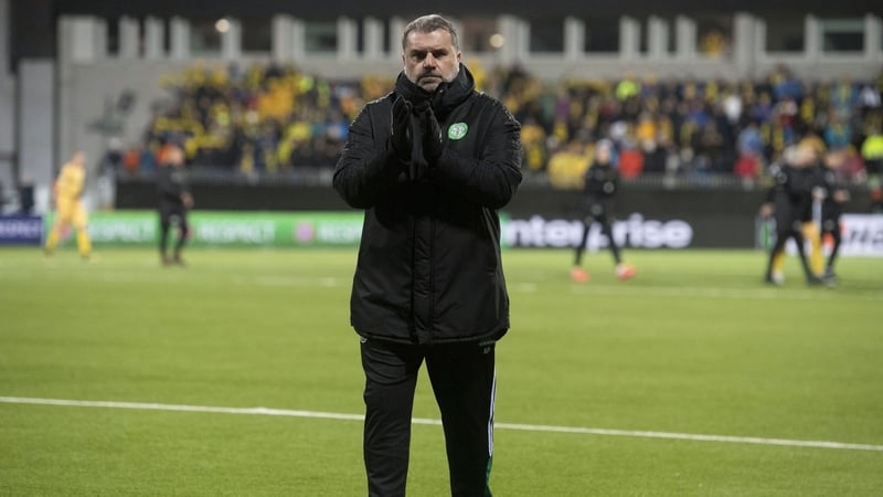 Ange Postecoglou applauds travelling Celtic fans after the game