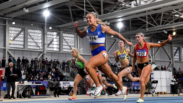 Molly Scott crosses the line first to win the senior women's 60m