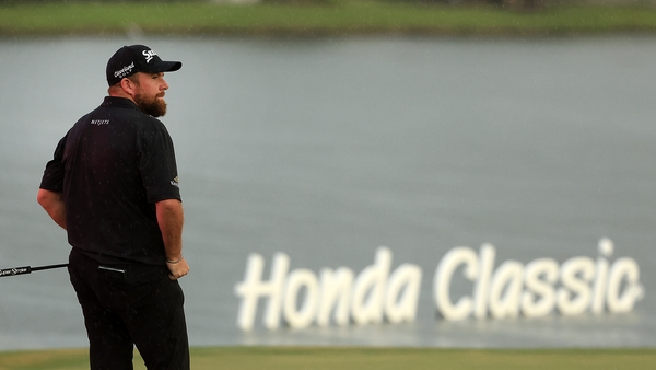 Shane Lowry reacts to a missed putt on the 18th green