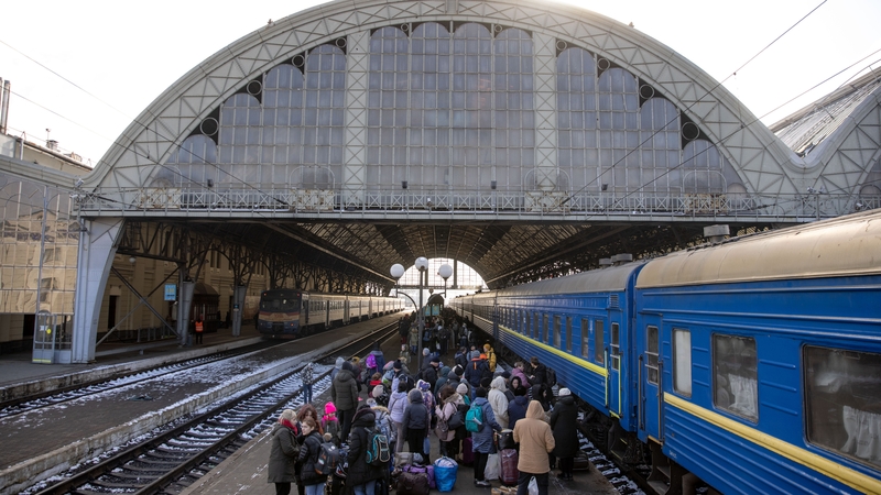 Displaced Ukrainians bound for Poland at the Lviv-Holovnyi railway station in Lviv
