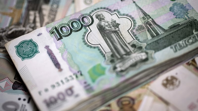 The rouble gained against the dollar but fell against the euro today