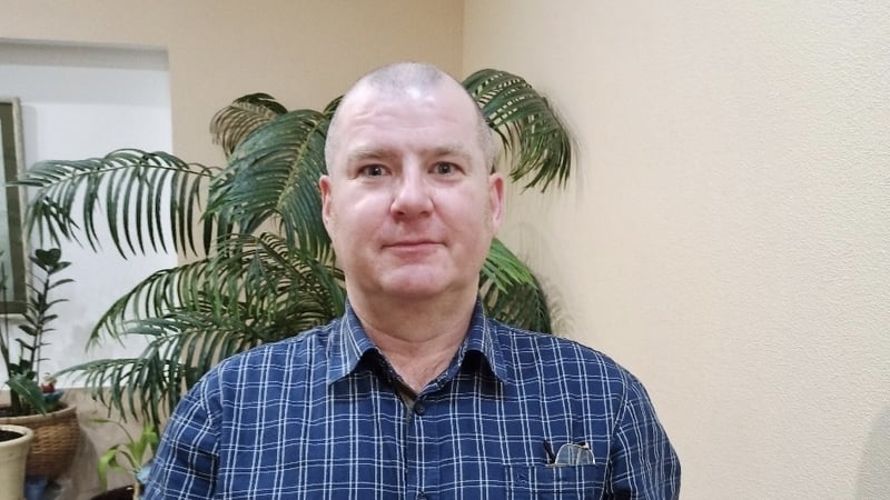 Hugh McEnaney said he will remain in Russia because it is not easy to relocate