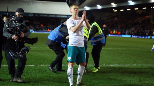 Zinchenko salutes the crowd on a night when he was handed the captains' armband