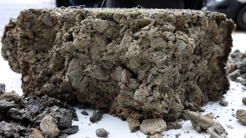 A concrete block affected by Mica