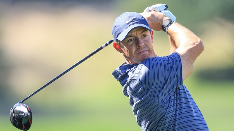 Rory McIlroy plays his tee shot on the 18th