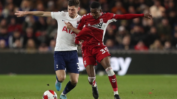 Tottenham's Ben Davies battles with Boro's Isaiah Jones during their Fifth Round tie.