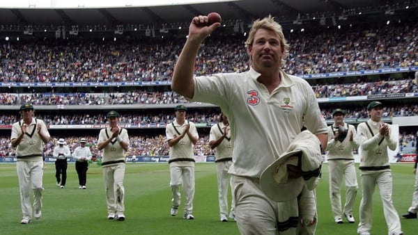 Shane Warne is applauded off the pitch by his Australian teammates during The Ashes series of 2006-2007