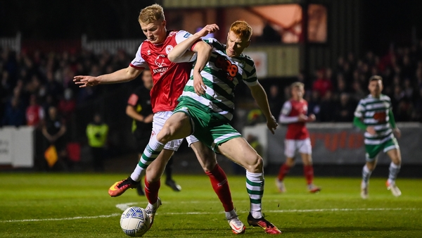 Rory Gaffney of Shamrock Rovers in action against Tom Grivosti of St Patrick's Athletic