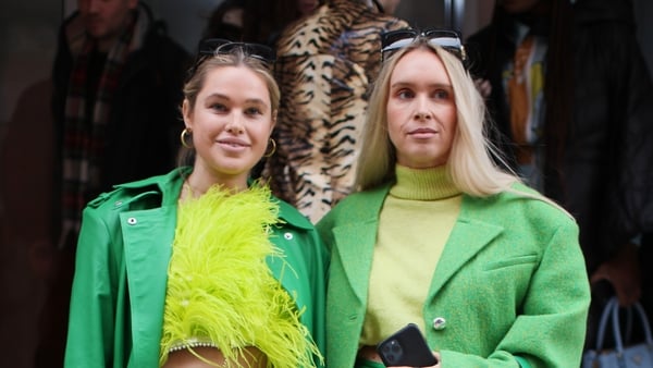 Olivia & Alice are seen wearing a Green Ensemble at Poster Girl during London Fashion Week. Photo: Getty