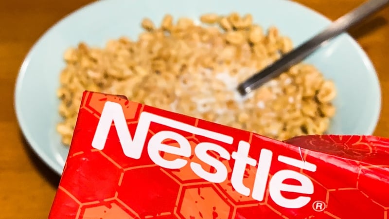 Nestle has lowered its full-year organic sales growth outlook to at least 3% from about 4% previously