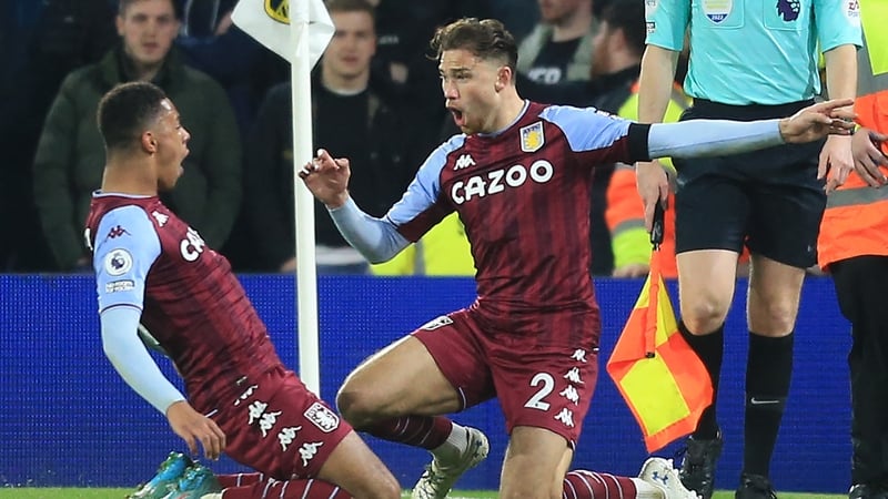Matty Cash (R) celebrates after scoring the critical second goal