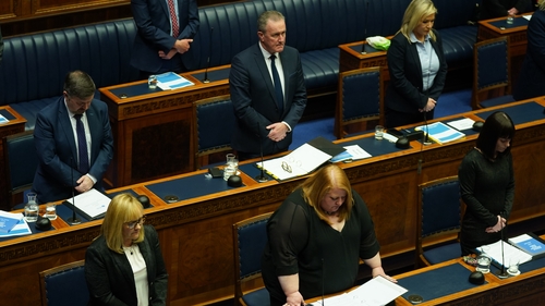 Ministers observe a minute's silence in the assembly
