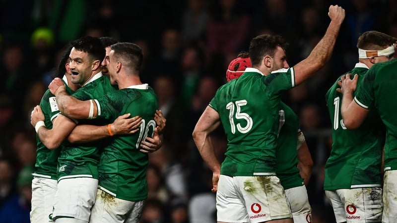 Ireland players celebrate their fourth try at Twickenham.