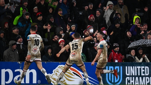 Ulster's players celebrate at the final whistle