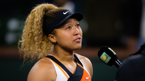 Osaka addresses the crowd after the match