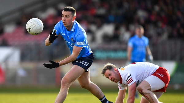 Cormac Costello of Dublin in action against Frank Burns of Tyrone