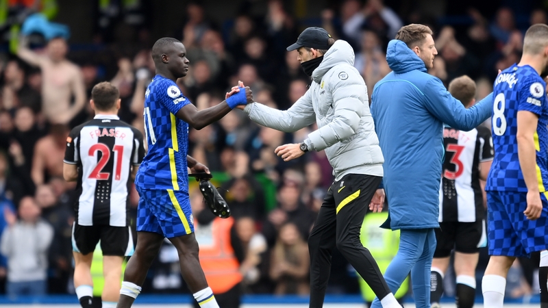 Malang Sarr interacts with Thomas Tuchel after the win over Newcastle
