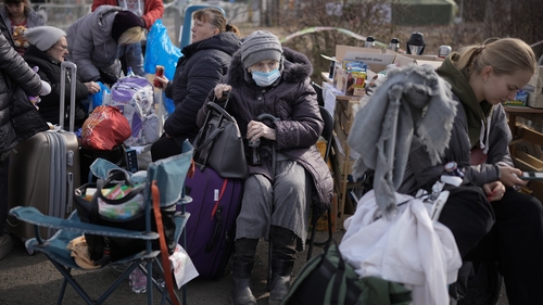 Refugees fleeing Ukraine arrive at the Vysne Nemecke border crossing today in Vysne Nemecke, Slovakia