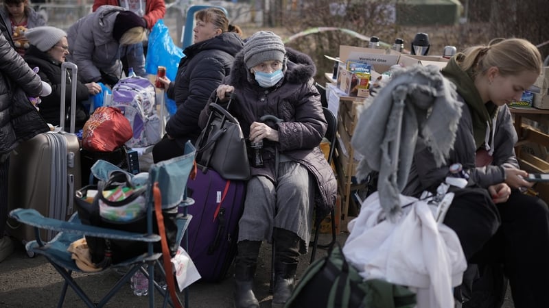 Refugees fleeing Ukraine arrive at the Vysne Nemecke border crossing today in Vysne Nemecke, Slovakia
