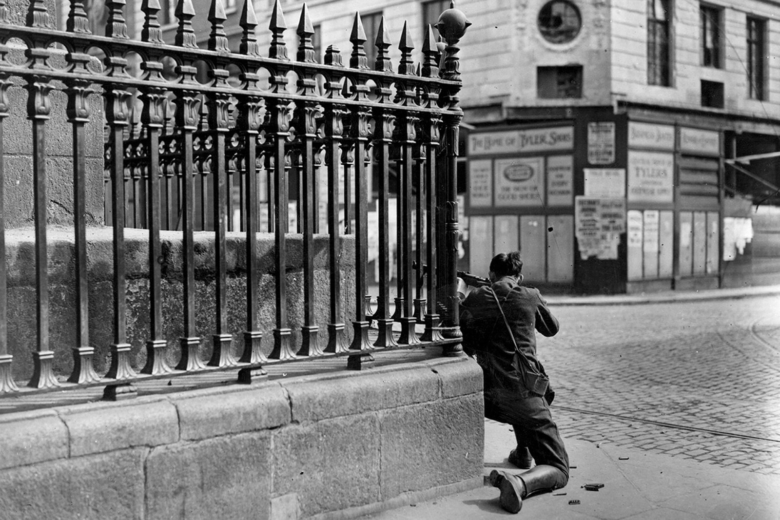 A sniper at the foot of Nelson's Pillar, facing the top of Talbot Street. Photo: Getty Images