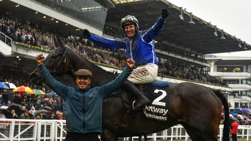 Jockey Paul Townend and groom Imran Haider celebrate with Energumene