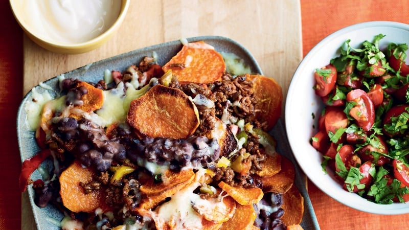 Tuck into slices of sweet potato loaded with veggie mince, beans, cheese and salsa.
