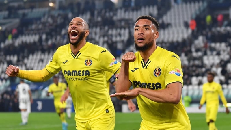 Arnaut Danjuma of Villarreal celebrates their sides third goal with team-mate Etien'ne Capoue