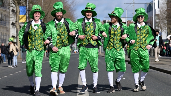 A group in fancy dress pose for a photograph on O'Connell St ahead of the parade