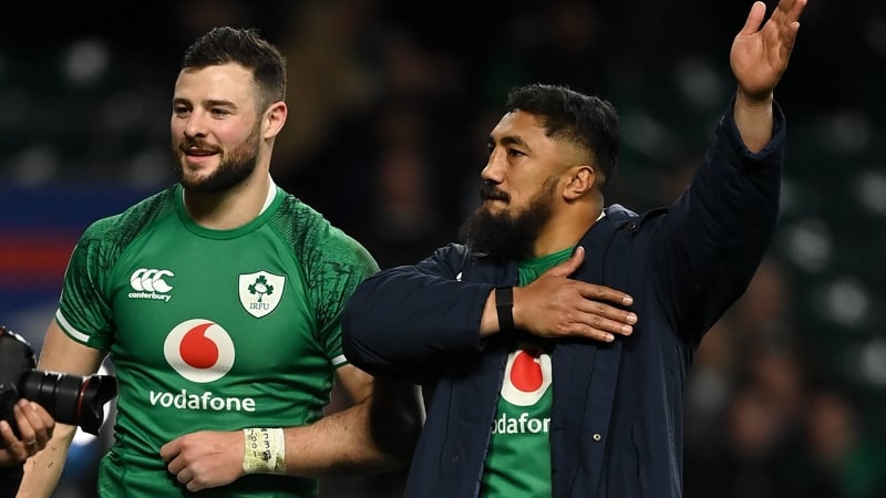 Robbie Henshaw and Bundee Aki (r) celebrate after beating England