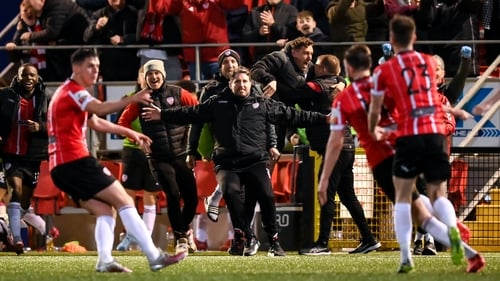 Will Patching runs to celebrate with the Derry bench after scoring the last minute winner