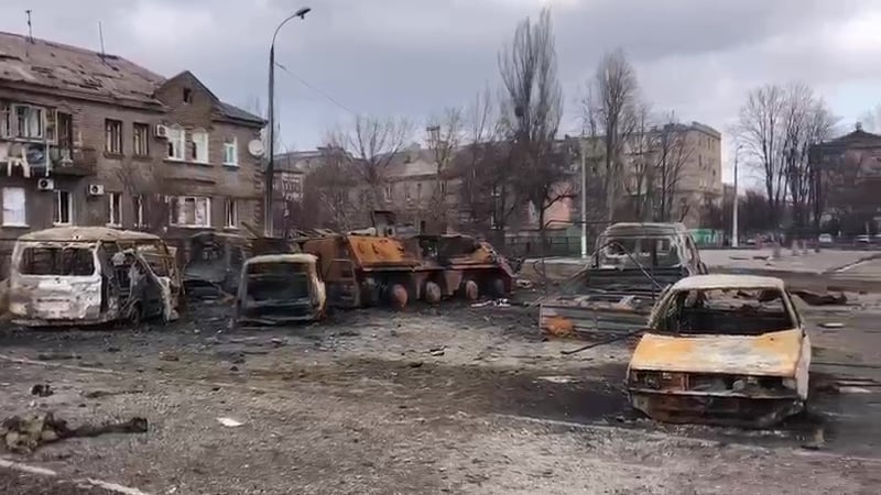 Buildings and vehicles are destroyed in Mariupol, Ukraine