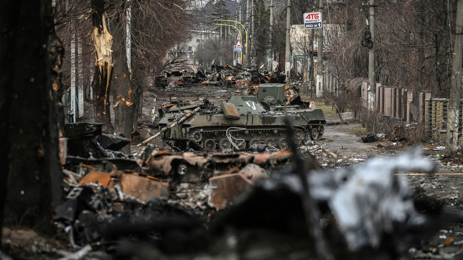 Destroyed Russian armoured vehicles in the city of Bucha, west of Kyiv
