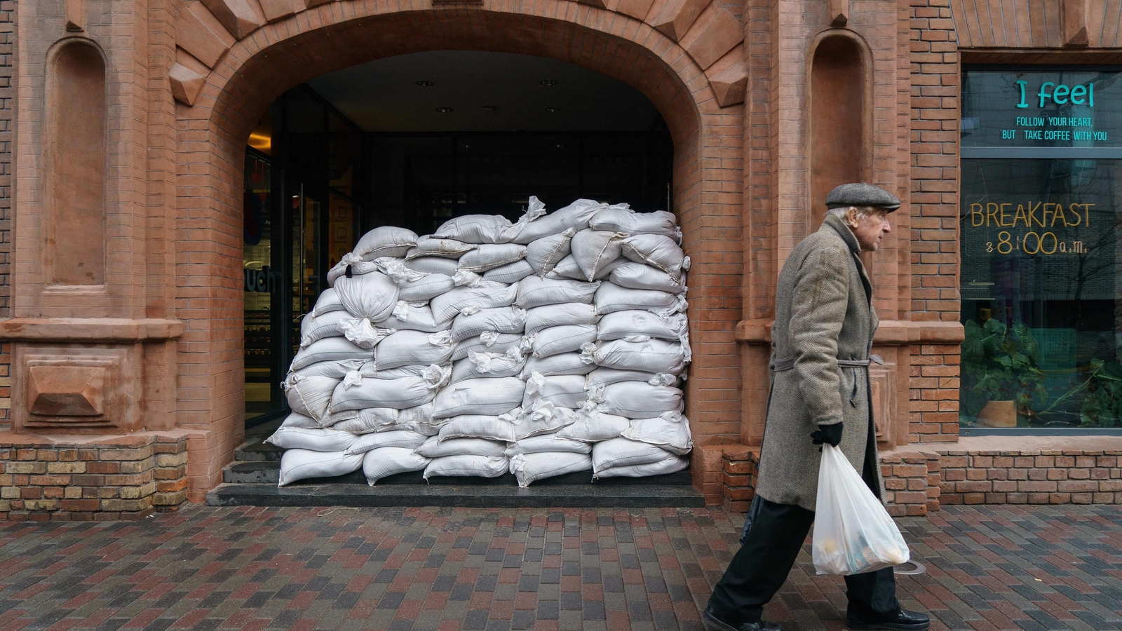 Sandbags placed to protect the entrance of a cafe in the Ukrainian city of Dnipro