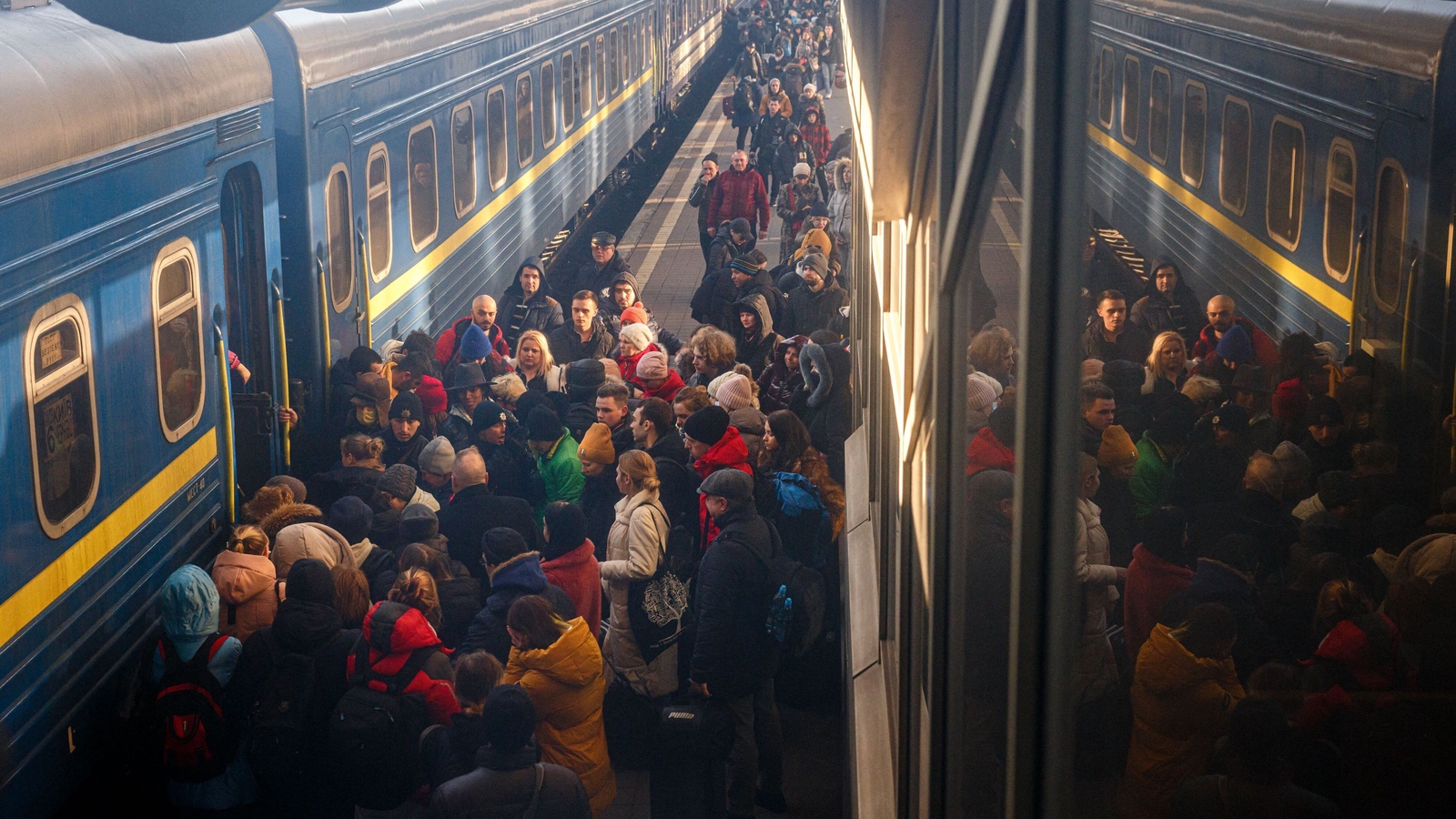 People board an evacuation train at Kyiv central train station on 28 February
