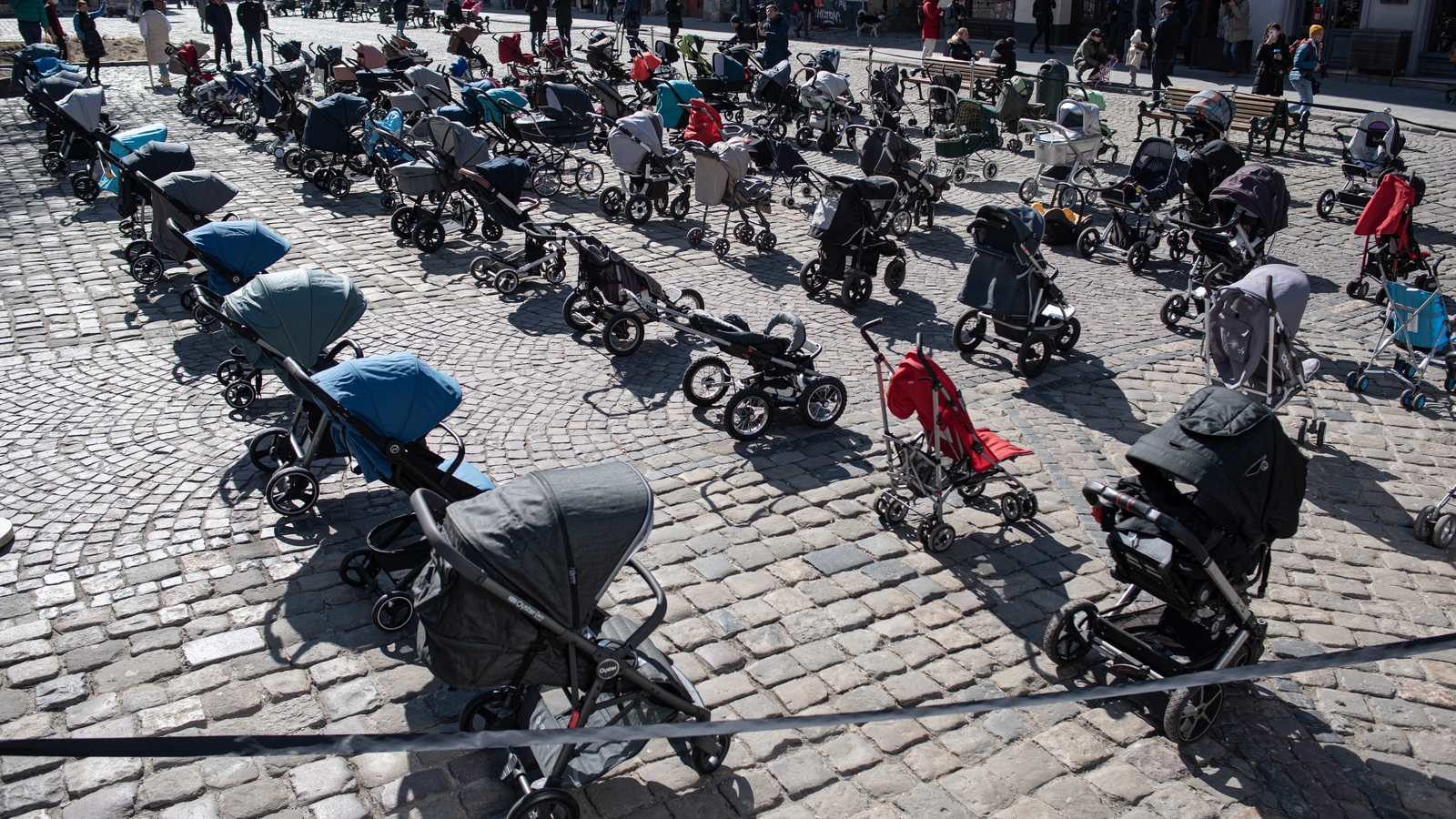 Empty prams placed outside the Lviv city council to highlight the number of children being killed in the invasion