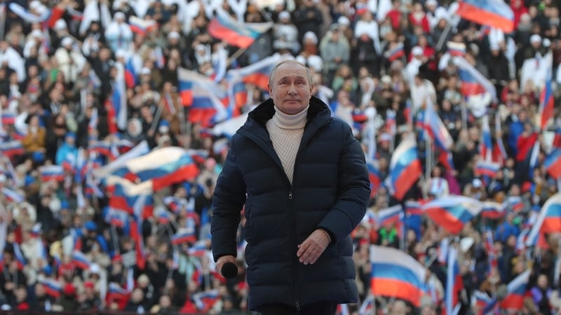 Russian president Vladimir Putin, wearing a €12,000 Loro Piana parka, at a concert marking the eighth anniversary of Russia's annexation of Crimea at the Luzhniki stadium in Moscow. Photo: Mikhail Klimentyev/ Sputnik/AFP via Getty Images