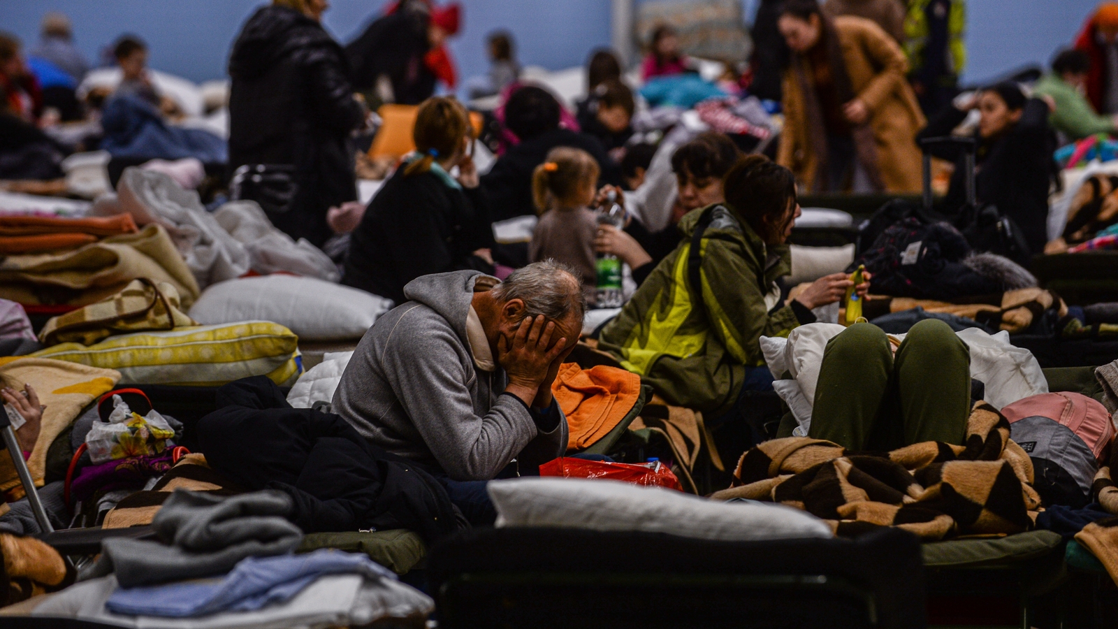 A temporary refugee shelter in an abandoned supermarket houses Ukrainian people in Poland